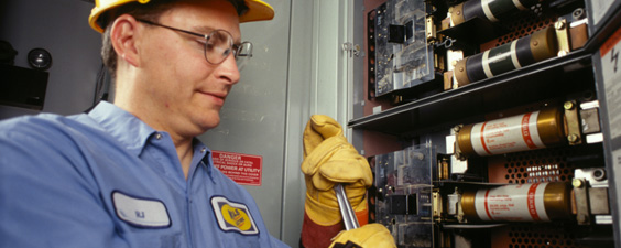 electrician installing commercial led lighting for commercial lighting purposes. 