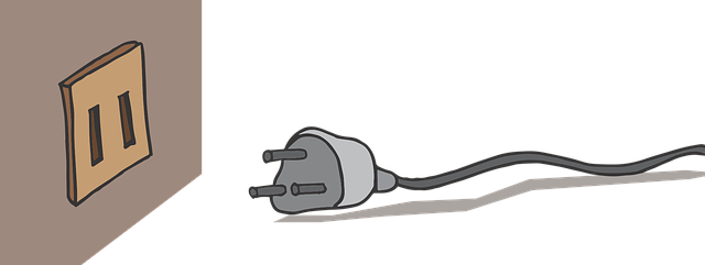 Cartoon drawing of an ungrounded outlet with a three-pronged plug laying next to it