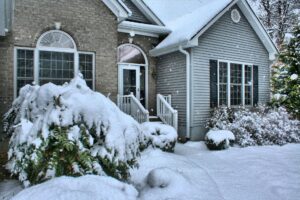 The outside of a house covered in snow